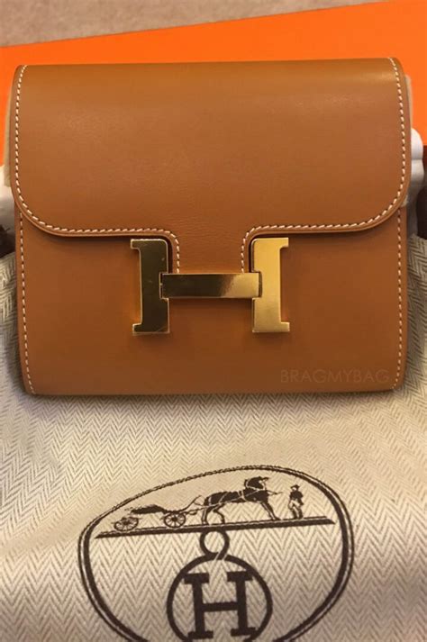 hermes constance wallet with strap.